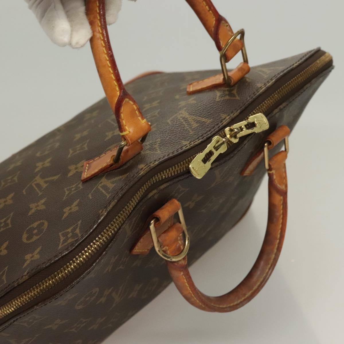 Monogram Alma Hand Bag