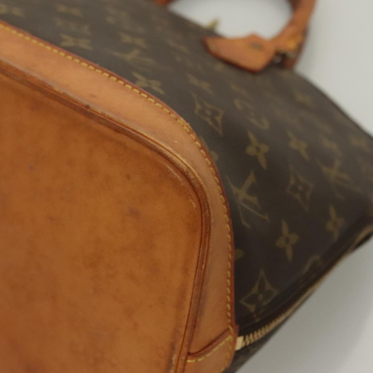 Monogram Alma Hand Bag