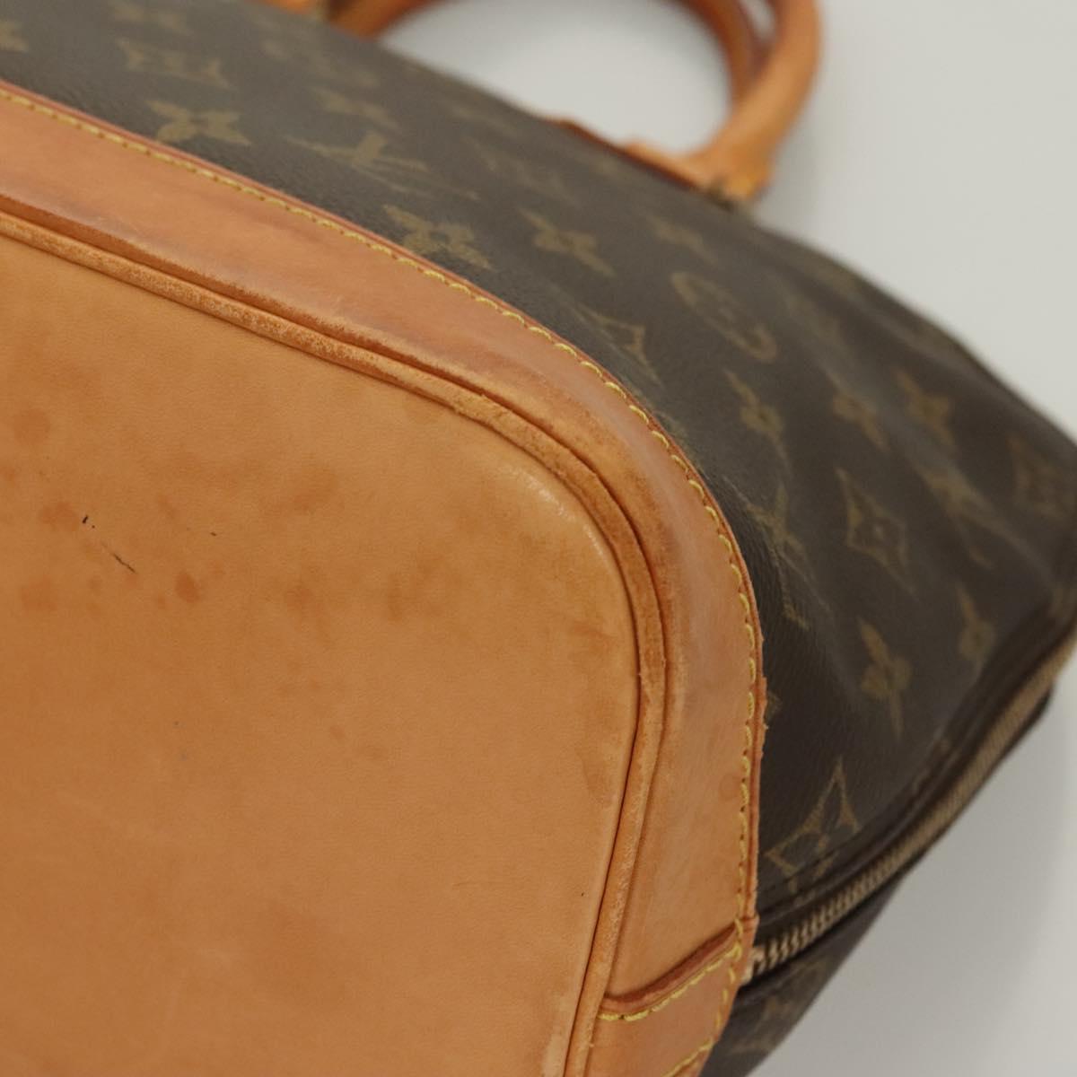 Monogram Alma Hand Bag