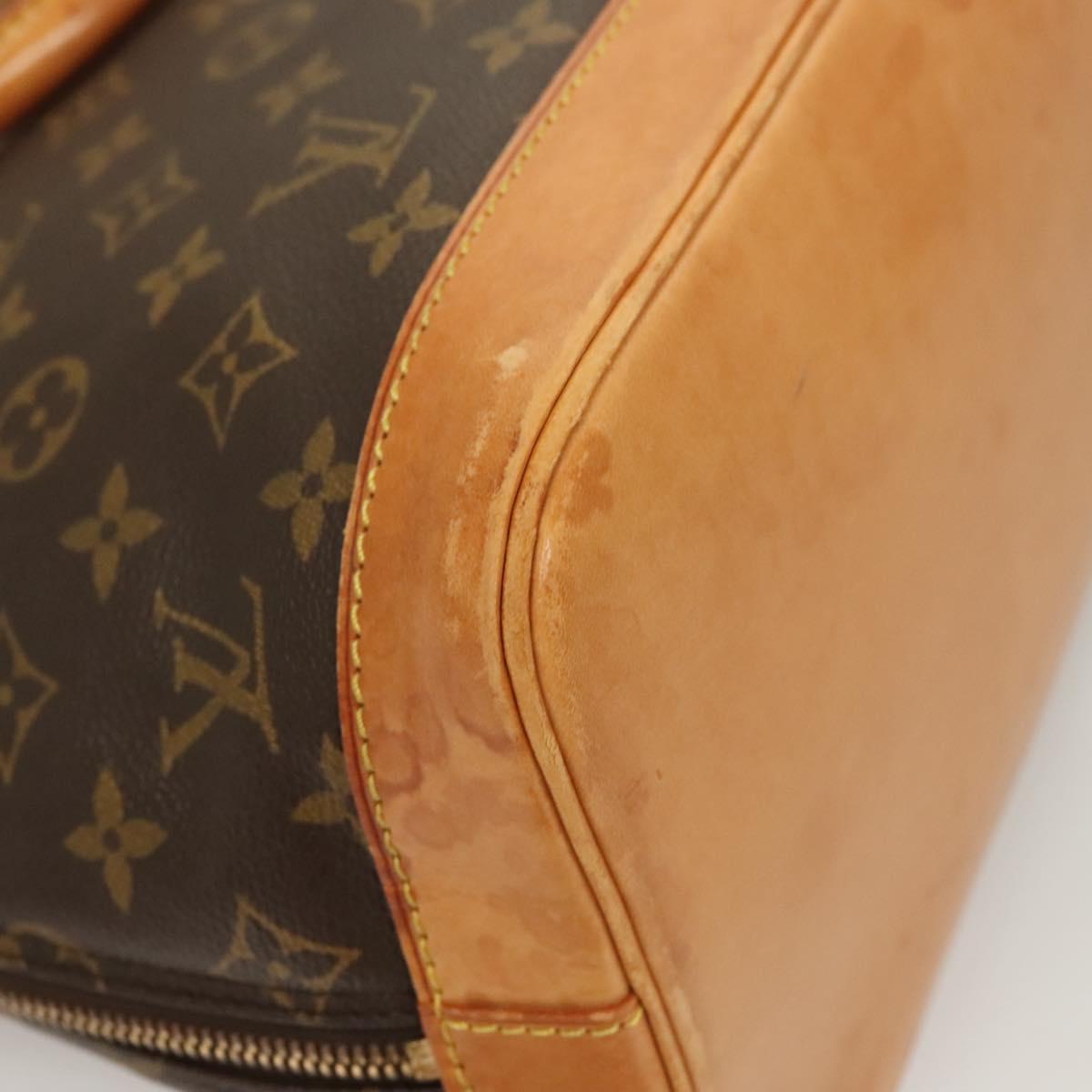 Monogram Alma Hand Bag