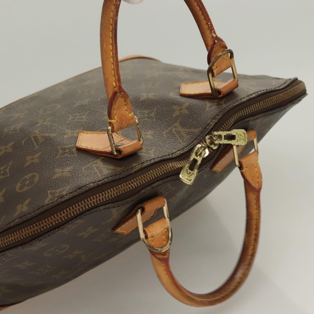 Monogram Alma Hand Bag