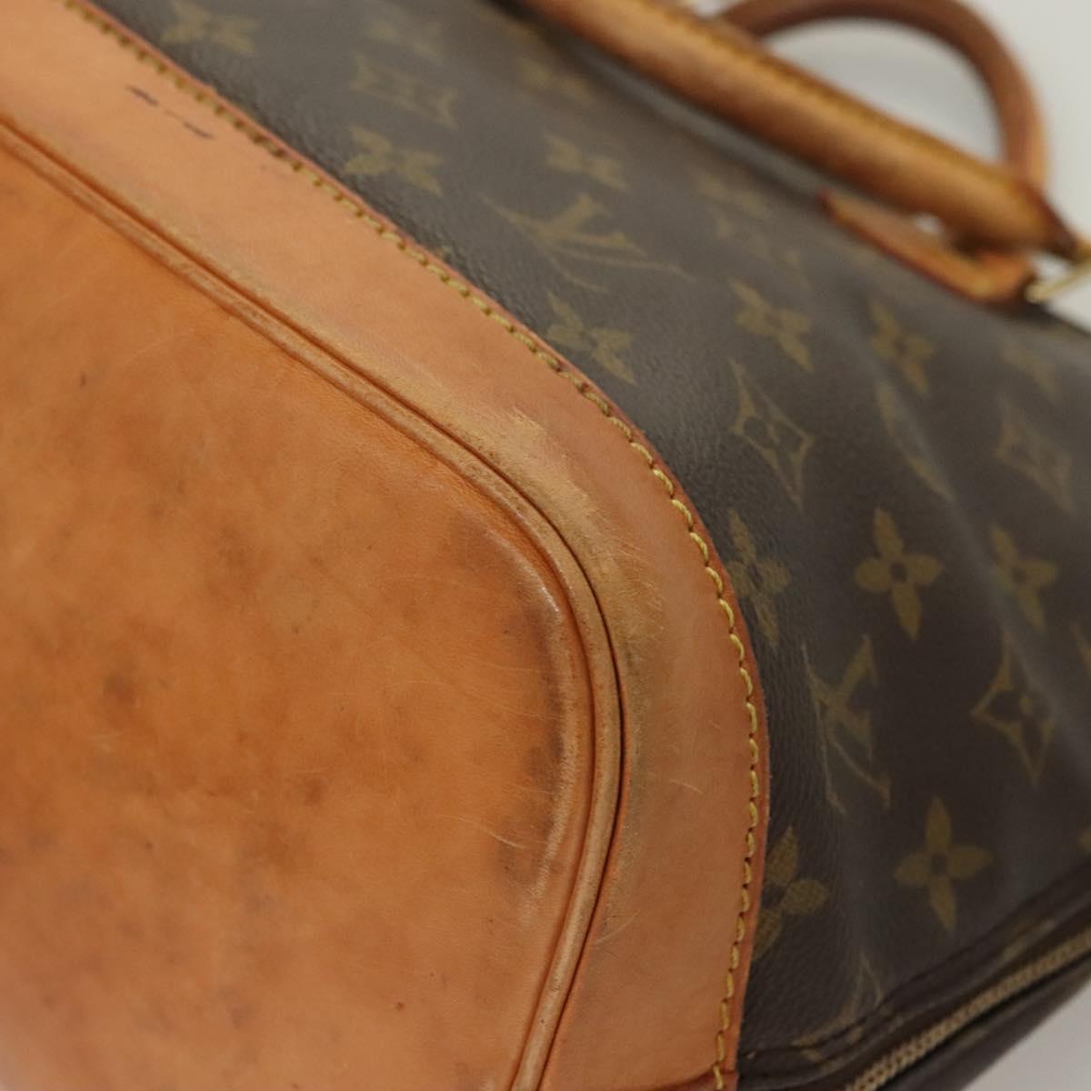 Monogram Alma Hand Bag