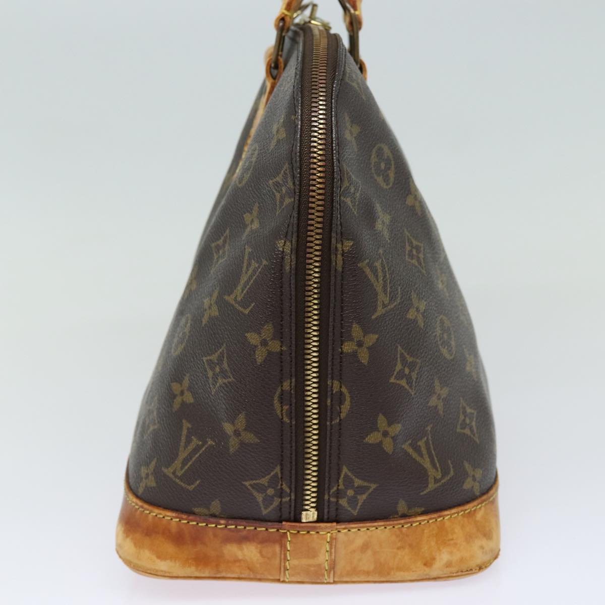 Monogram Alma Hand Bag