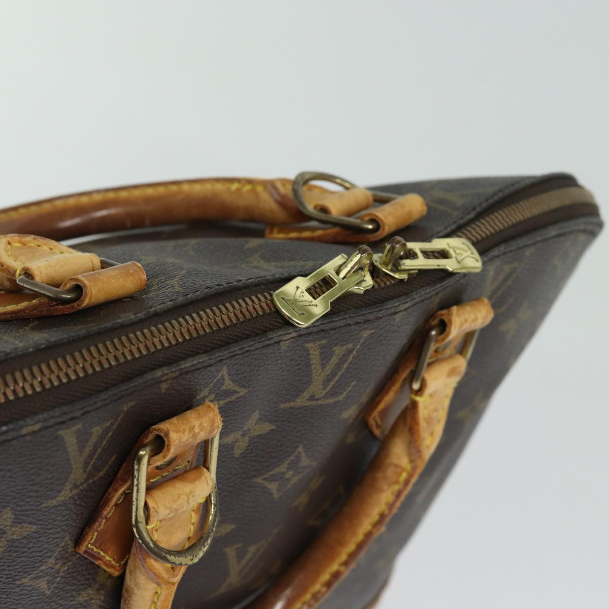 Monogram Alma Hand Bag