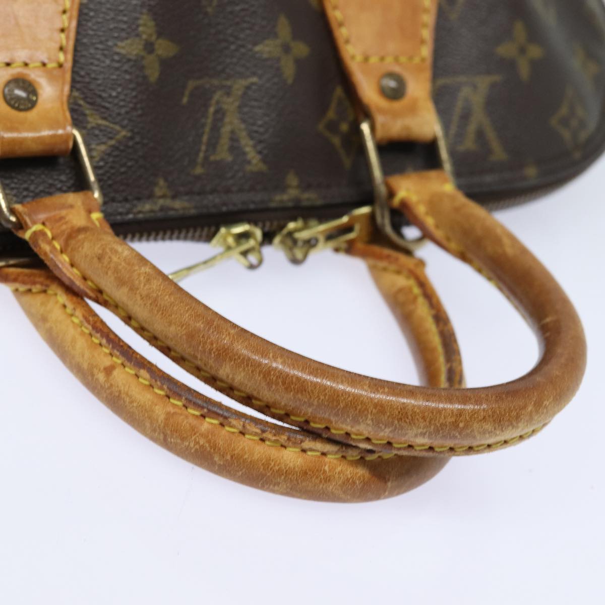 Monogram Alma Hand Bag