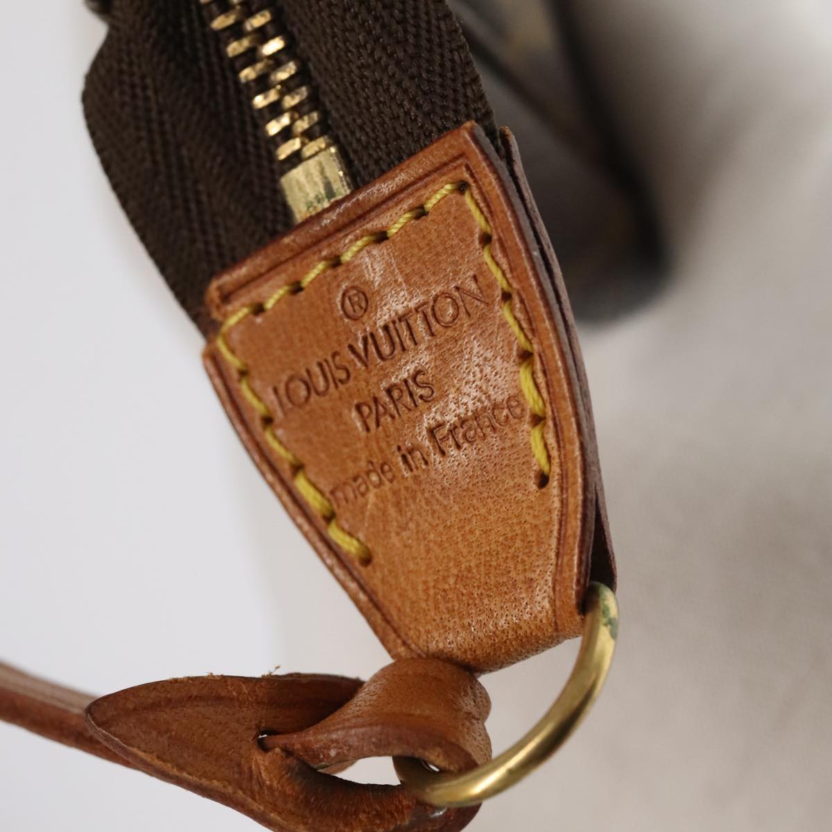 Monogram Pochette -tarvikepussi