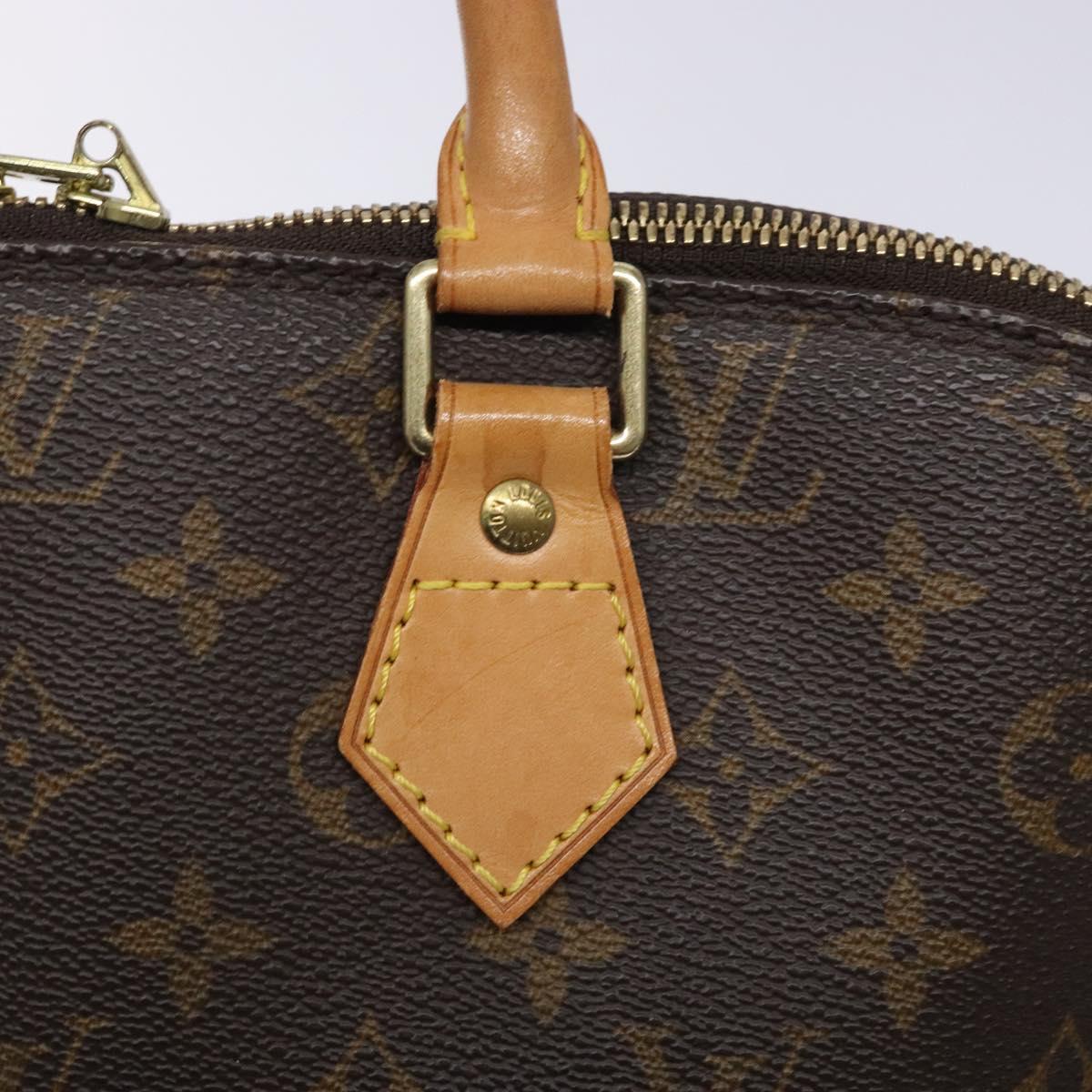 Monogram Alma Hand Bag