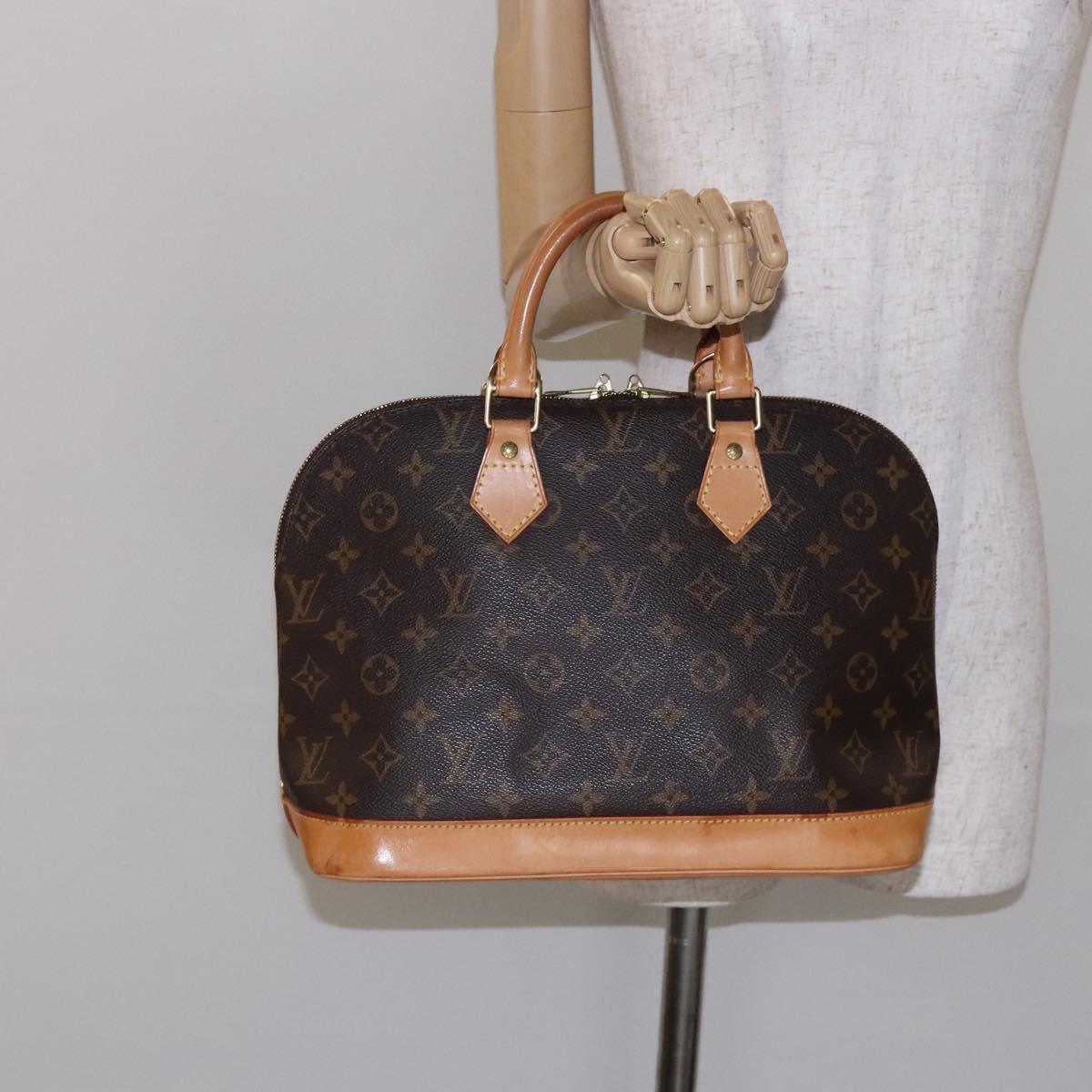 Monogram Alma Hand Bag