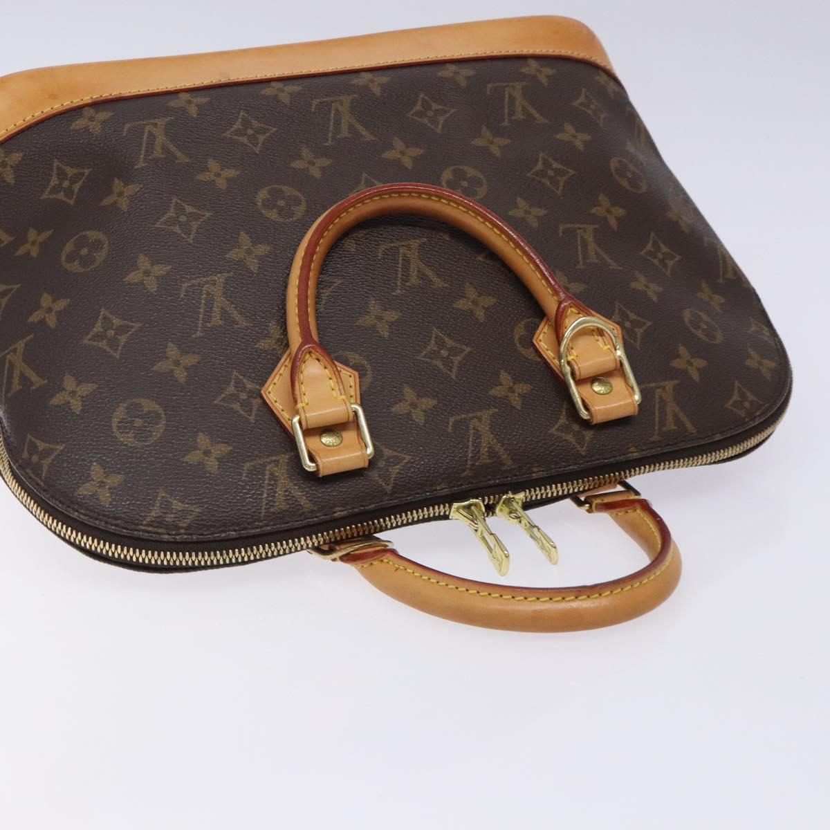 Monogram Alma Hand Bag