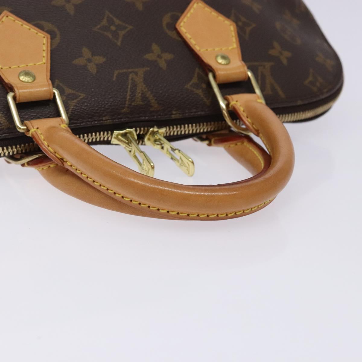 Monogram Alma Hand Bag