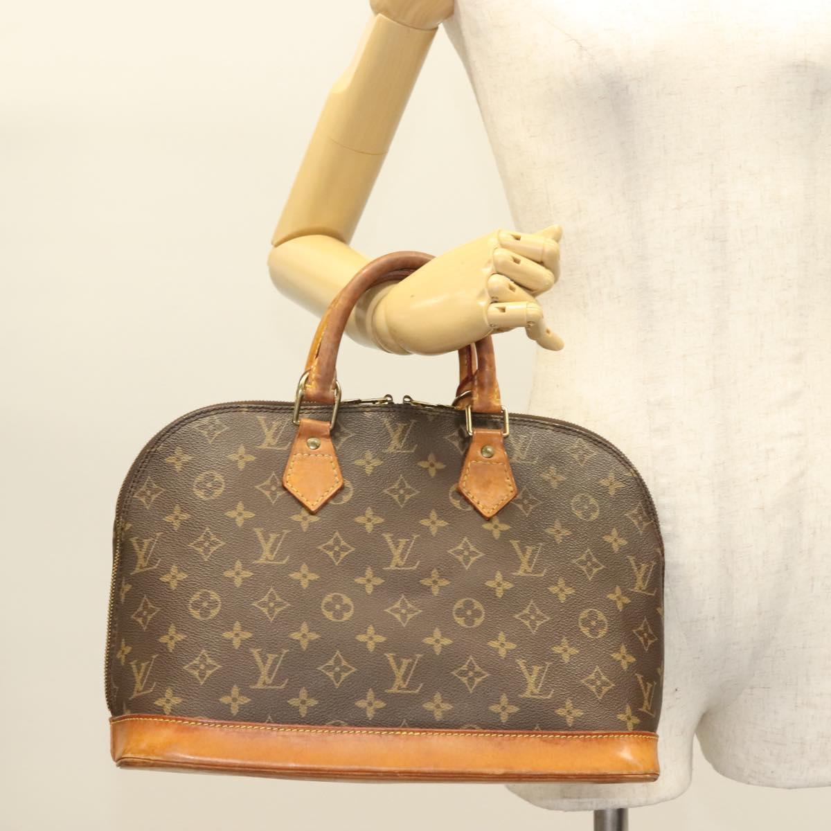 Monogram Alma Hand Bag