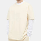 Fear of God Essentials "Buttercream" Tee (SS21) - T-shirt | Trendiga kläder & skor - Merchsweden |