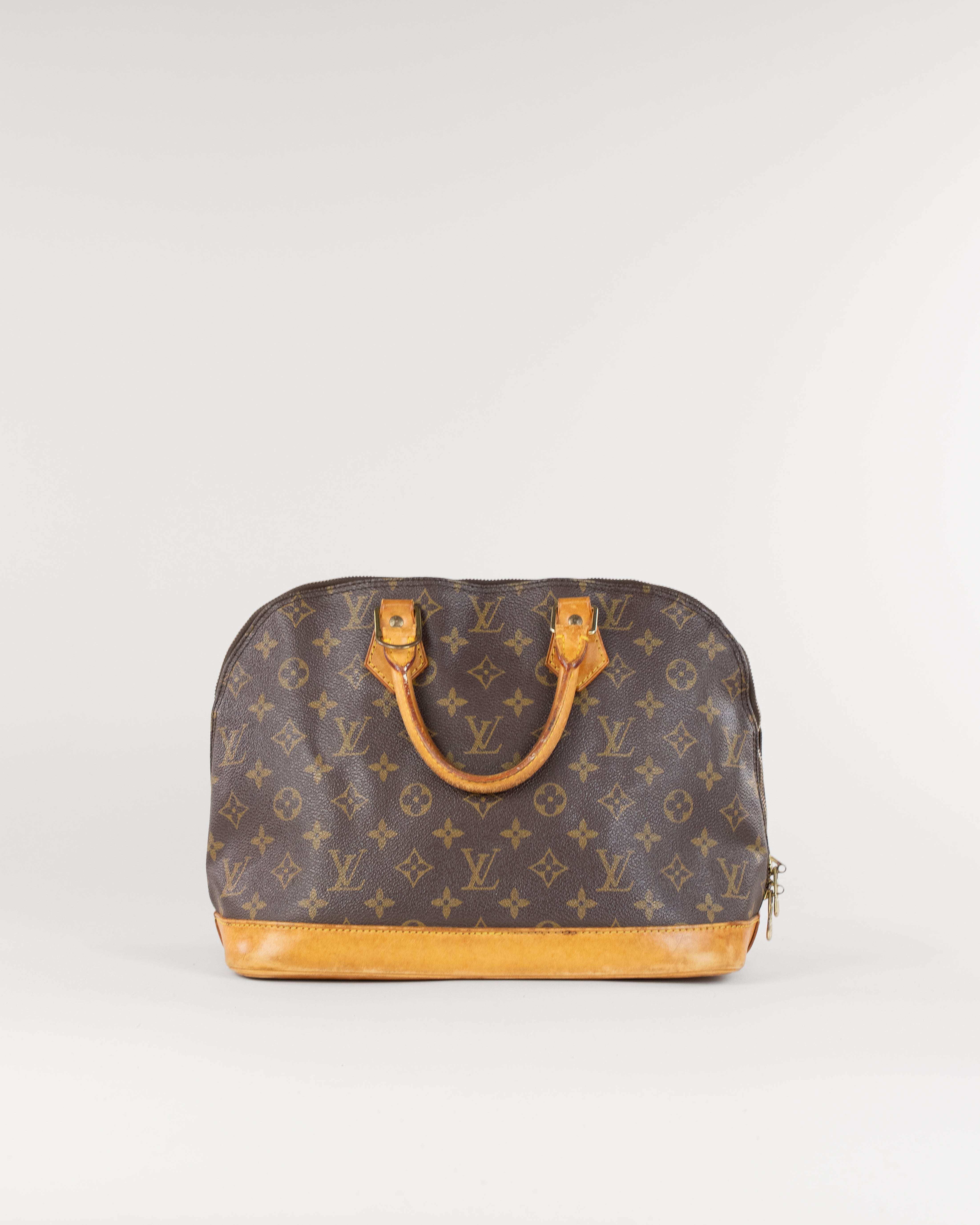 Monogram Alma Hand Bag