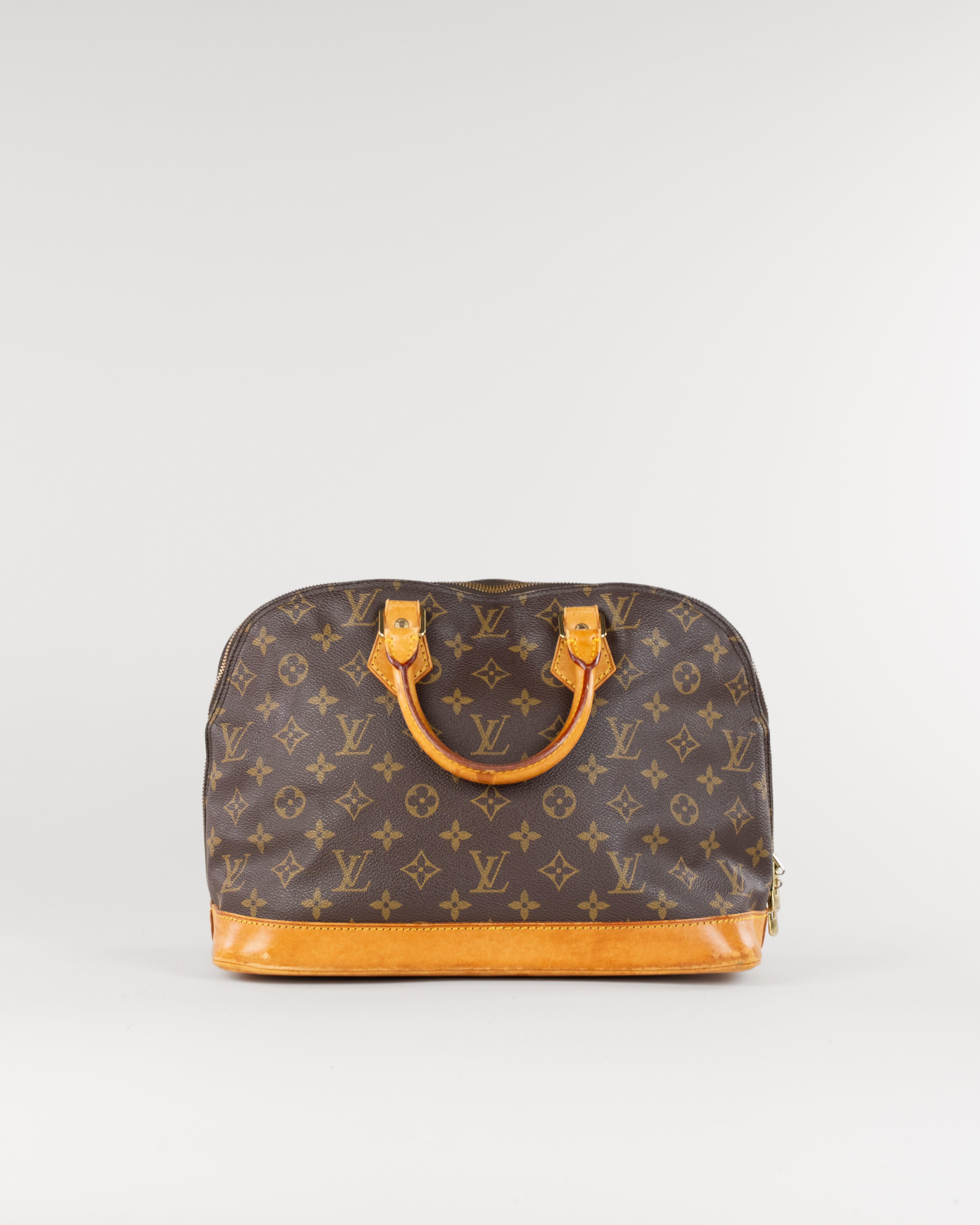 Monogram Alma Hand Bag