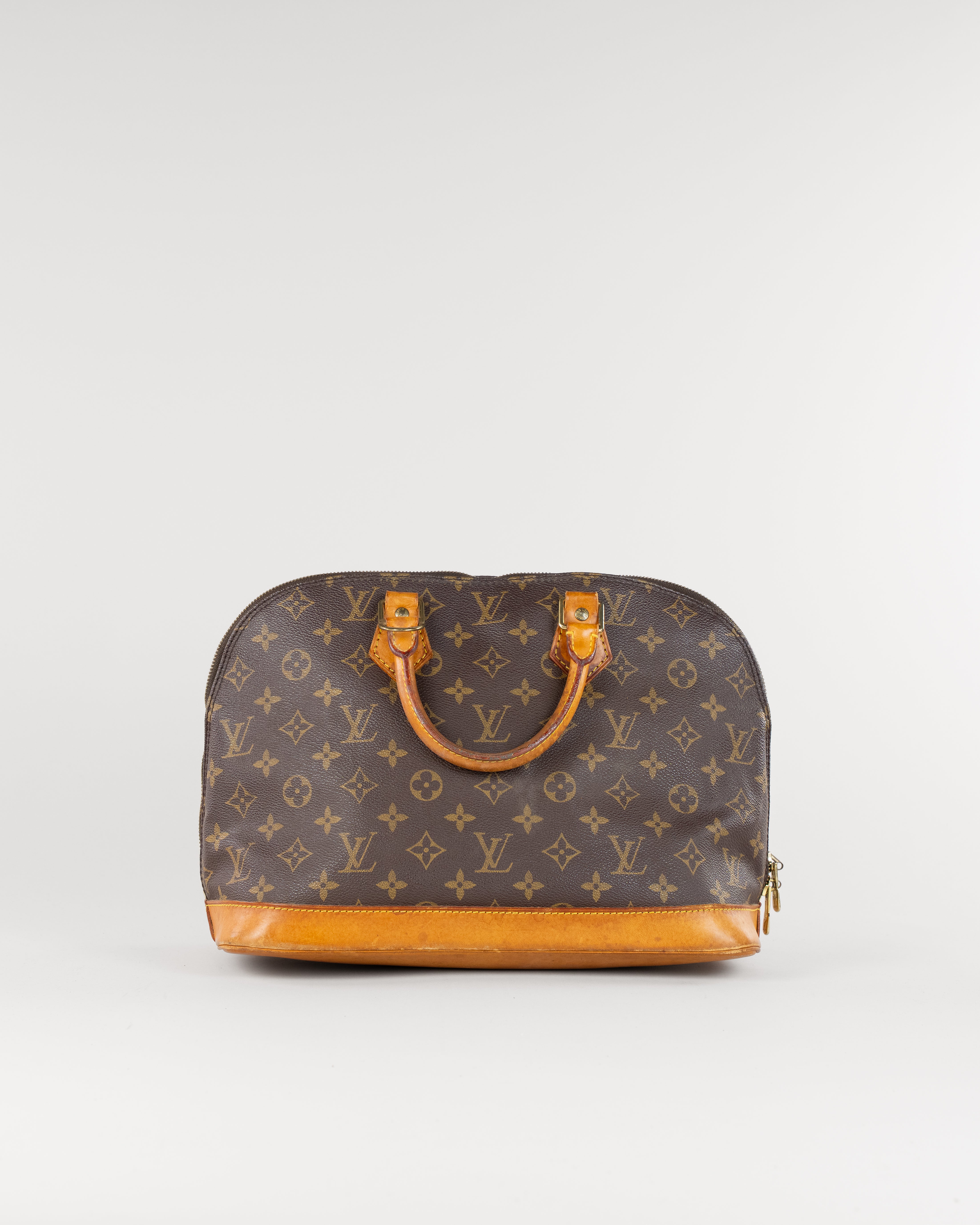 Monogram Alma Hand Bag