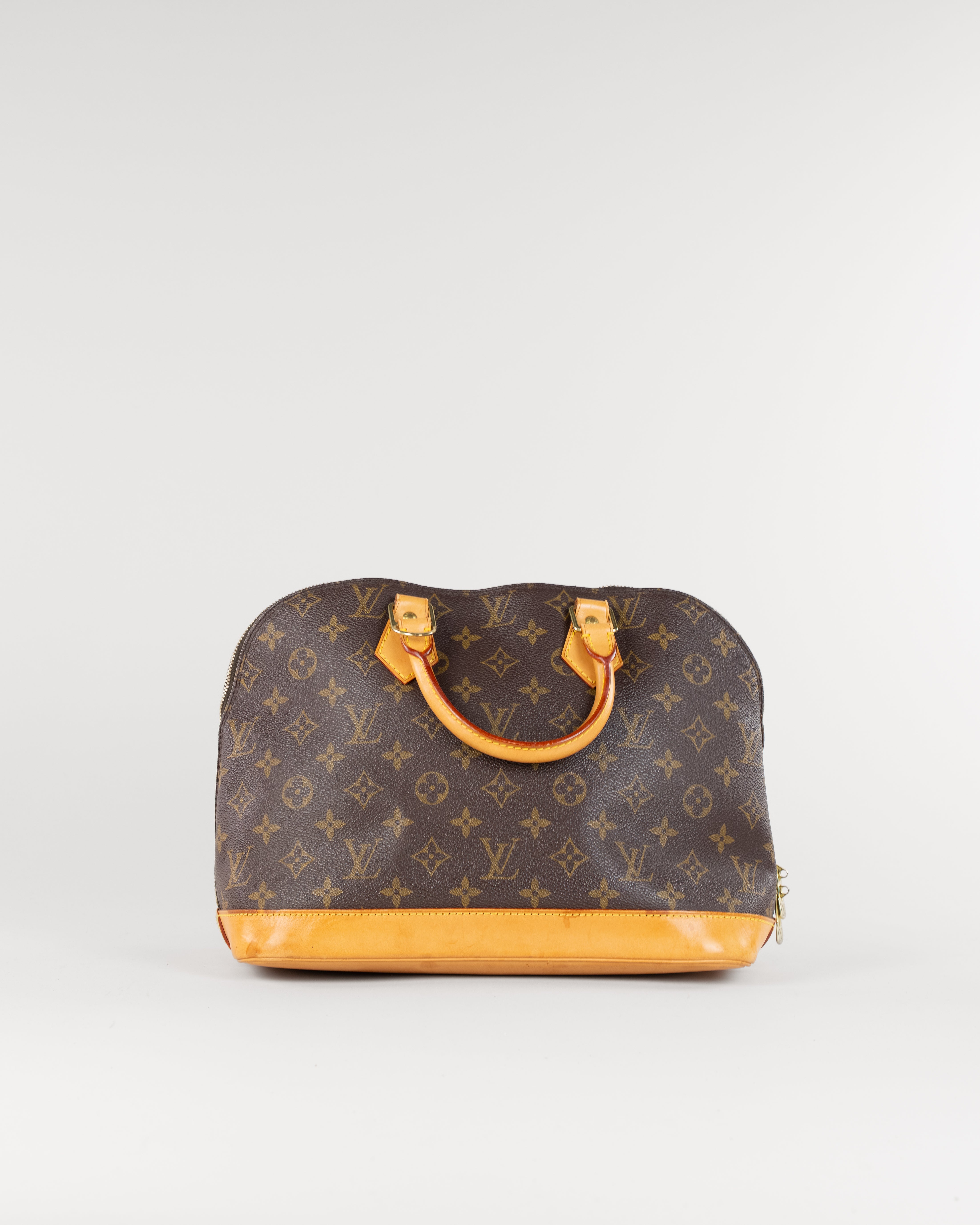 Monogram Alma Hand Bag