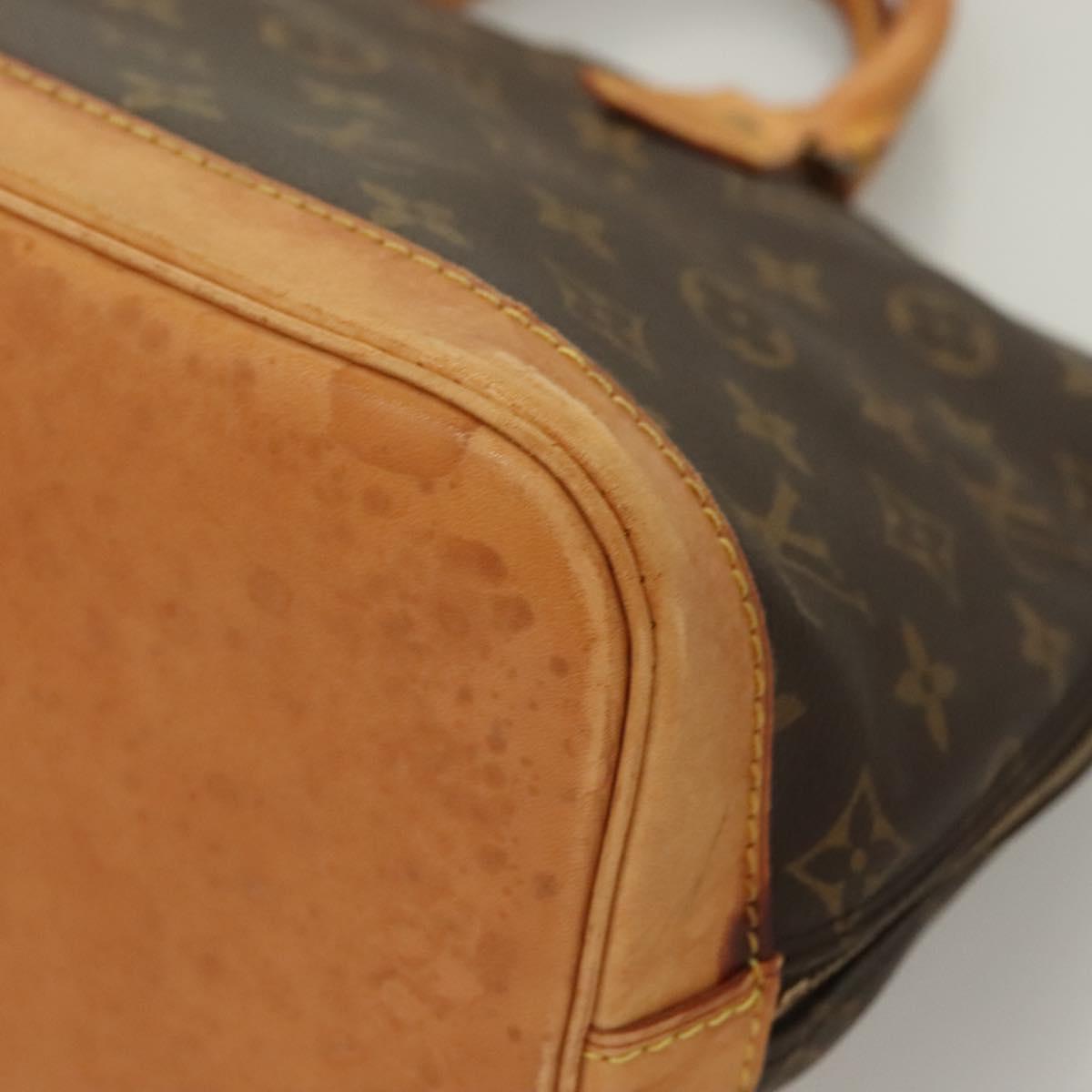 Monogram Alma Hand Bag