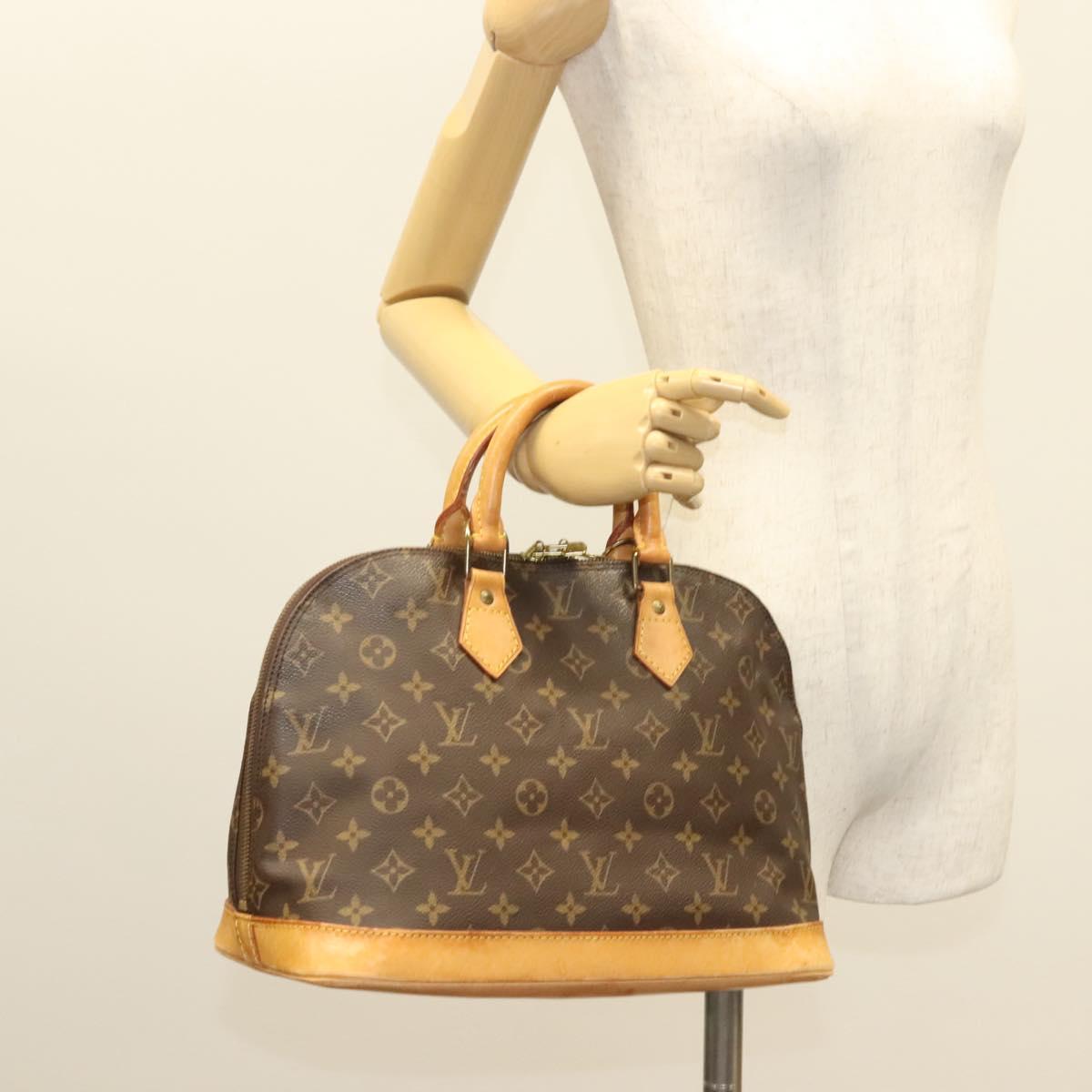 Monogram Alma Hand Bag
