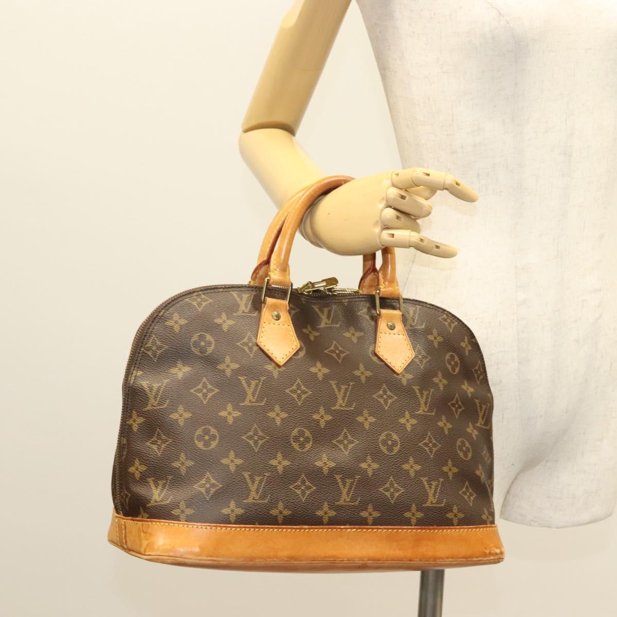 Monogram Alma Hand Bag