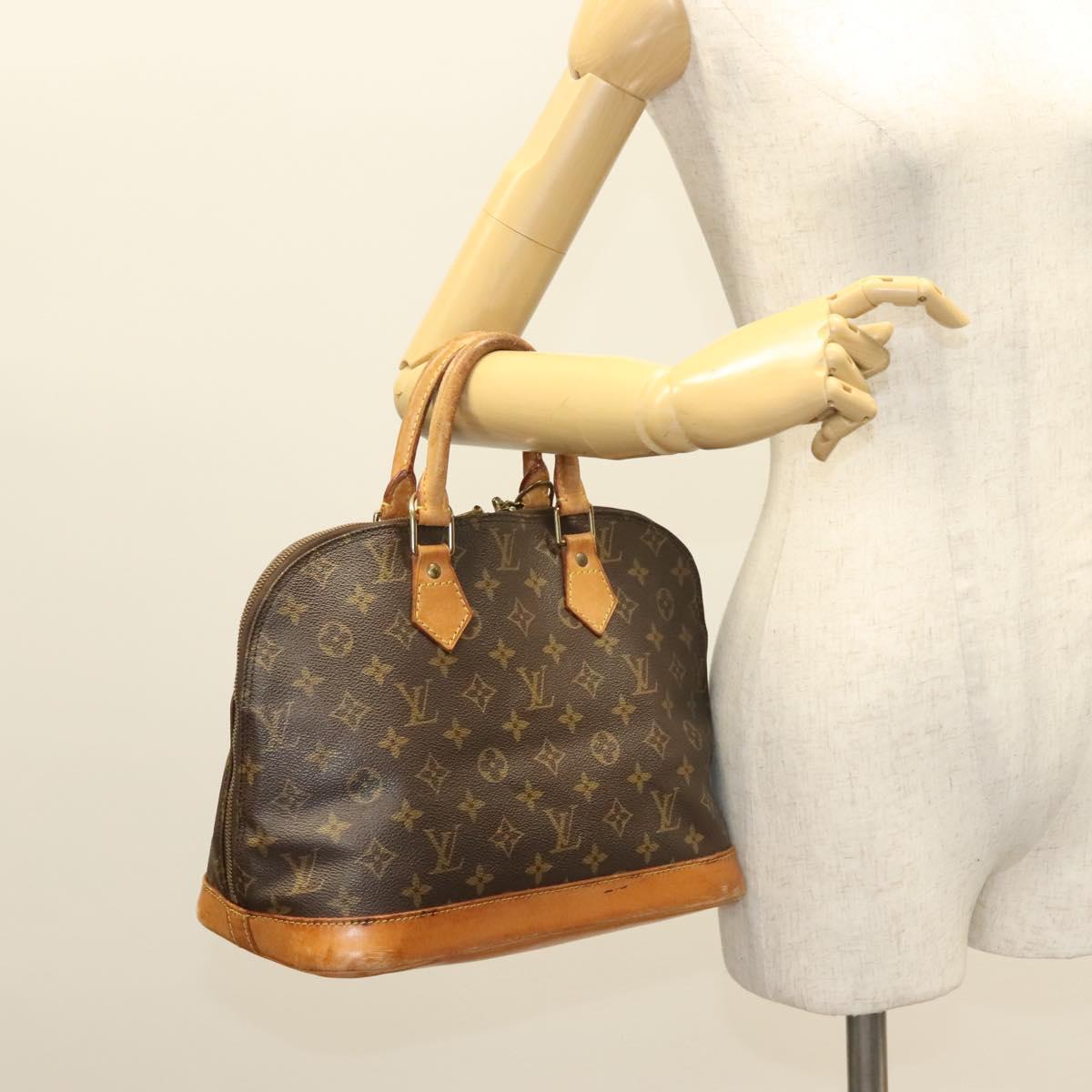 Monogram Alma Hand Bag